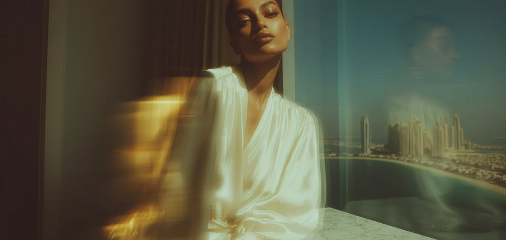 Model wearing jewelry in Dubai skyline