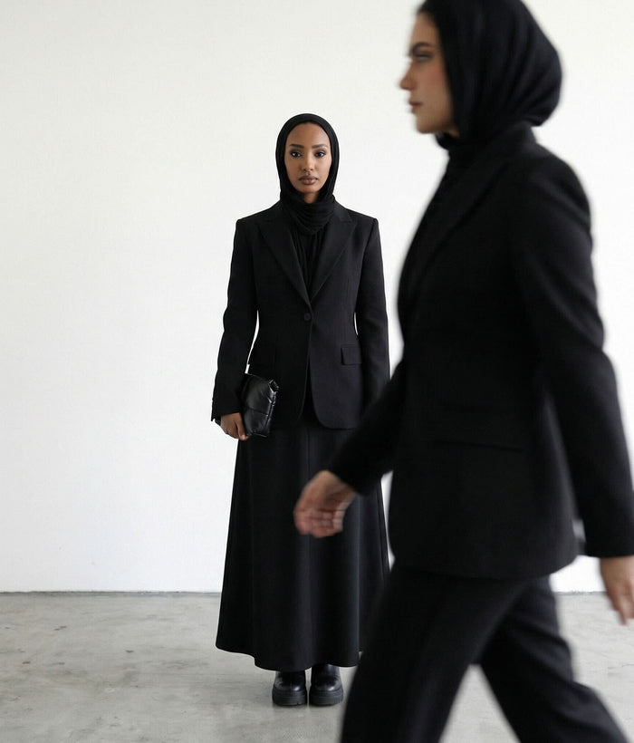 Model wearing jewelry in Dubai skyline