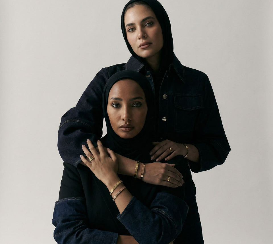 Model wearing jewelry in Dubai skyline