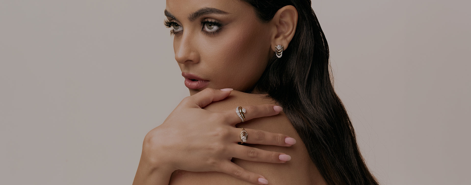 Model wearing jewelry in Dubai skyline