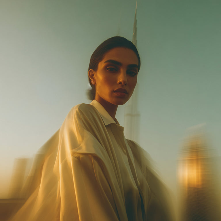 Model wearing jewelry in Dubai skyline