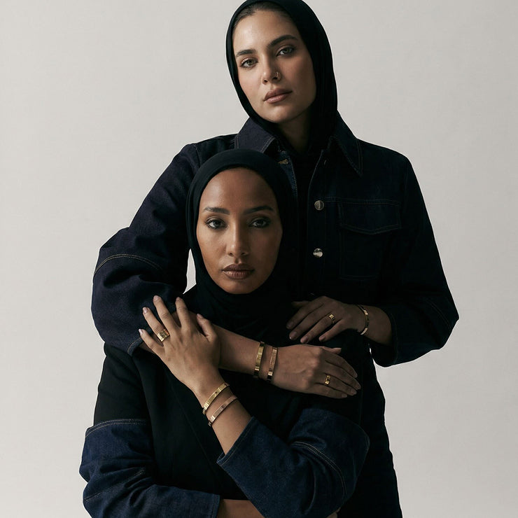 Model wearing jewelry in Dubai skyline